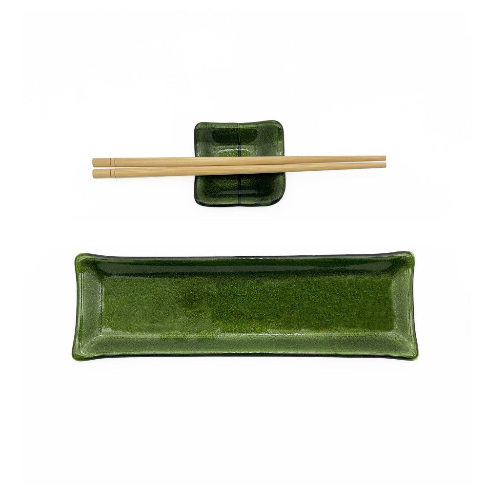 Handmade green glass sushi set featuring a rectangular serving plate, matching square sauce dish, and a pair of light wood chopsticks on a white background.