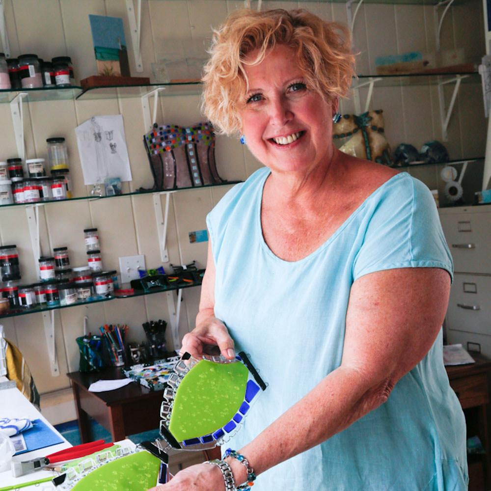 Chelsea Rousso in her glass studio