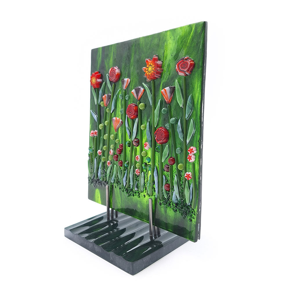 Angled view of the Red Roses Panel, highlighting the raises, three-dimensional texture of the fused glass blooms and leaves.
