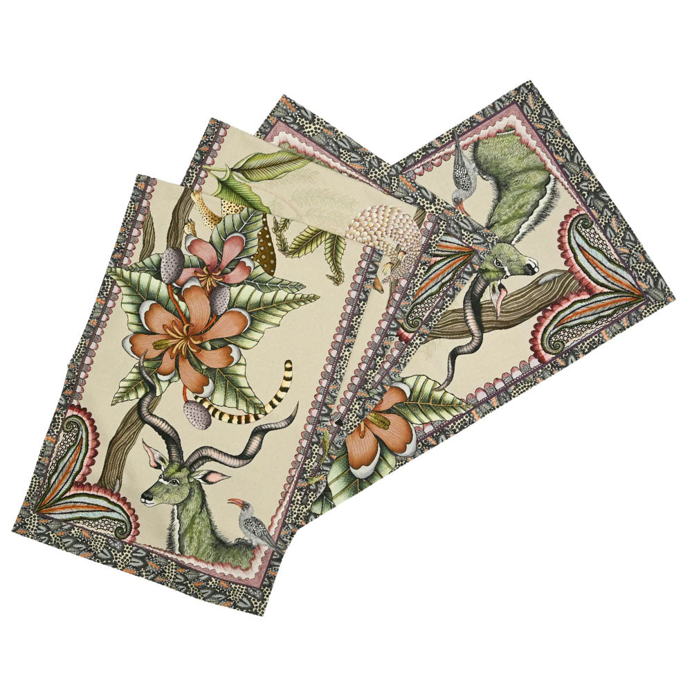 Folded Ardmore table runner featuring colorful flowers, wildlife, curling branches, and an ornate patterned border on a cream background.