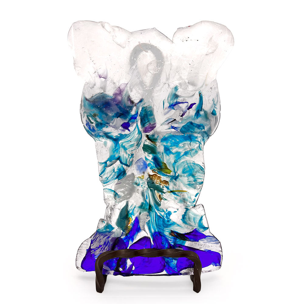 Front view of a handmade translucent glass bust sculpture with layered turquoise, aqua, cobalt blue, purple, and clear glass details, displayed upright on a dark metal stand against a white background.