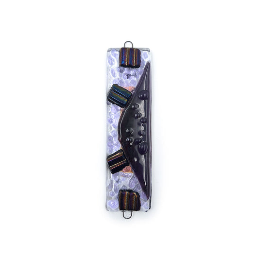 Handmade glass mezuzah featuring a clear textured rectangular base with a dark sculptural center, iridescent striped glass accents, and metal hanging loops on a white background.