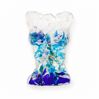 Front view of a handmade translucent glass bust sculpture with abstract turquoise, aqua, cobalt blue, purple, and clear glass details, shown without a display stand on a white background.