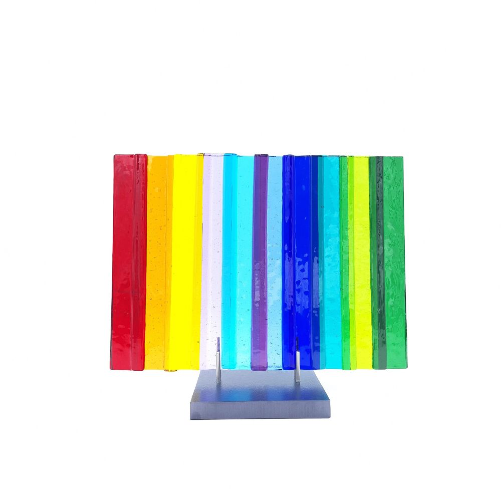 Front view of the Medium Rainbow Panel featuring vertical glass strips in yellow, red, orange, lavender, blue, green, turquoise, and cobalt on a silver-tone base.
