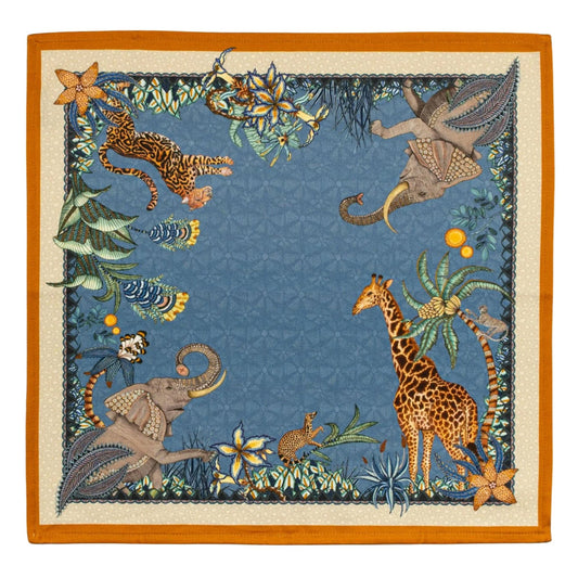 Sabie Forest napkin in tanzanite blue with elephants, giraffe, cheetah, monkey, foliage, and orange border.