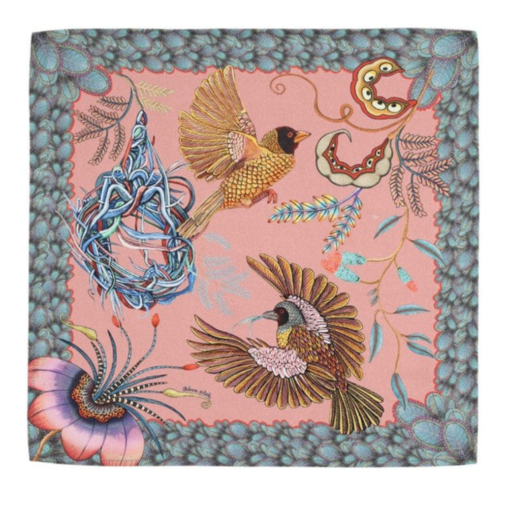 Magnolia pink Thanda Nest napkin with African masked weaver birds, woven nest, flowers, foliage, and patterned border.