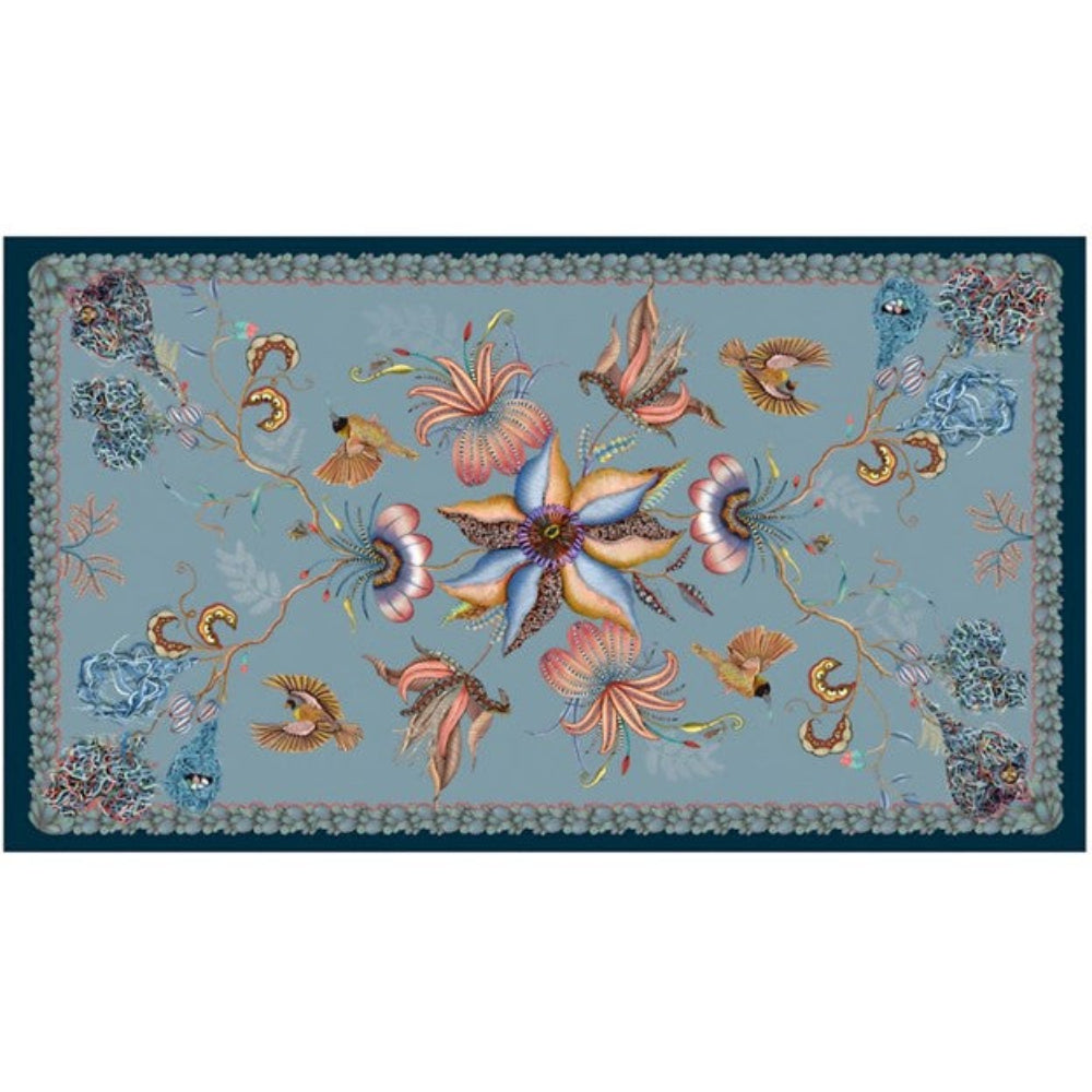 Mist blue Thanda Nest tablecloth with African masked weaver birds, flowers, foliage, and woven nest details.