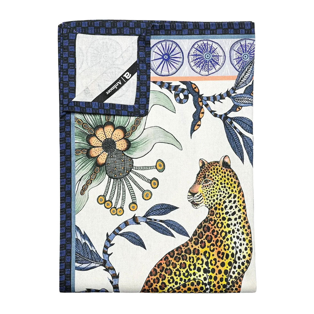 Back and folded view of the Lovebird Leopards Tea Towel showing the patterned front, light fabric backing, dark blue border, and Ardmore label.