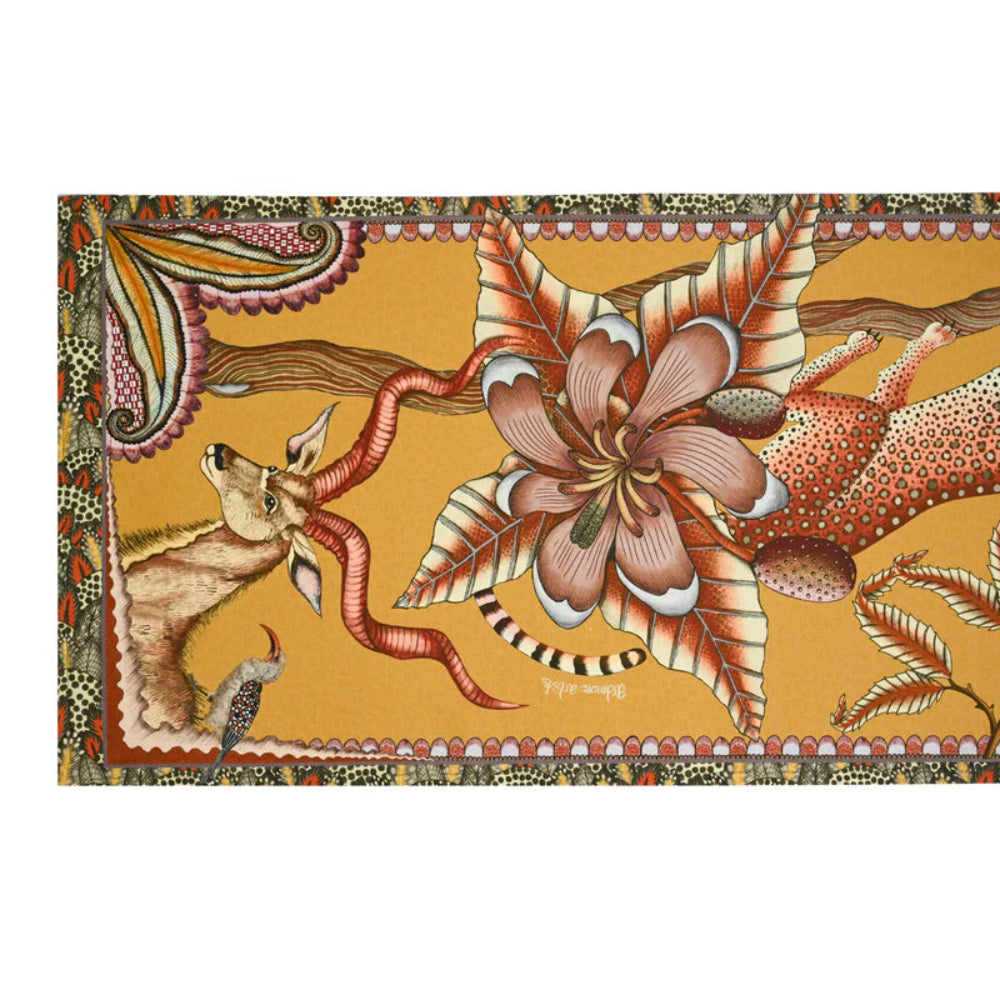 Full-length Pangolin Park table runner showing kudu, zebra, leopard, flowers, and savannah-inspired details.