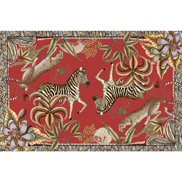 Rectangular Ardmore tablecloth featuring zebras, leopards, a pangolin, tropical flowers, and lush foliage on a rich red background with a patterned border.