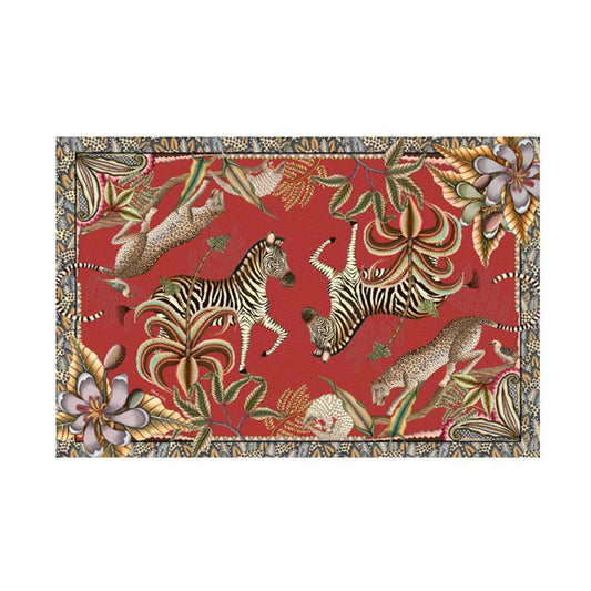 Rectangular Ardmore tablecloth featuring zebras, leopards, a pangolin, tropical flowers, and lush foliage on a rich red background with a patterned border.