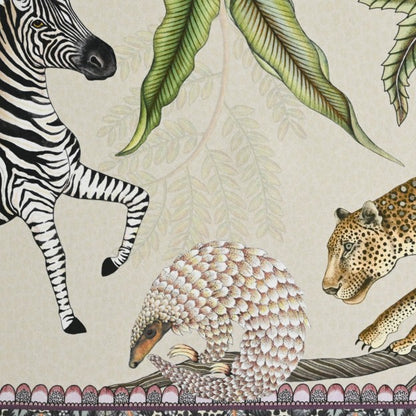 Close-up of the Ardmore table runner featuring a zebra, leopard, curled pangolin, tropical foliage, and a decorative border.