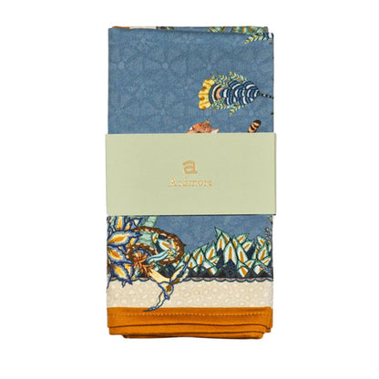 Packaged Sabie Forest napkins in Ardmore wrap with blue safari animal and foliage print.