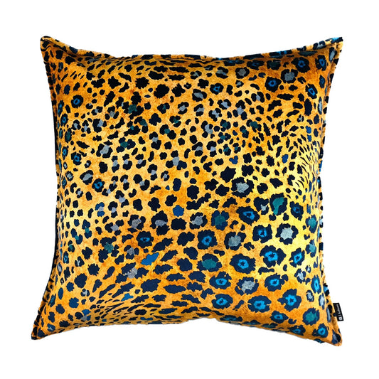 Safari Spot Pillow featuring a bold golden yellow leopard print with black and deep blue spots on a square decorative pillow.