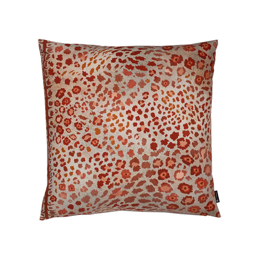Front view of the square Safari Pillow featuring a rust-red and beige leopard spot print on soft velvet fabric.