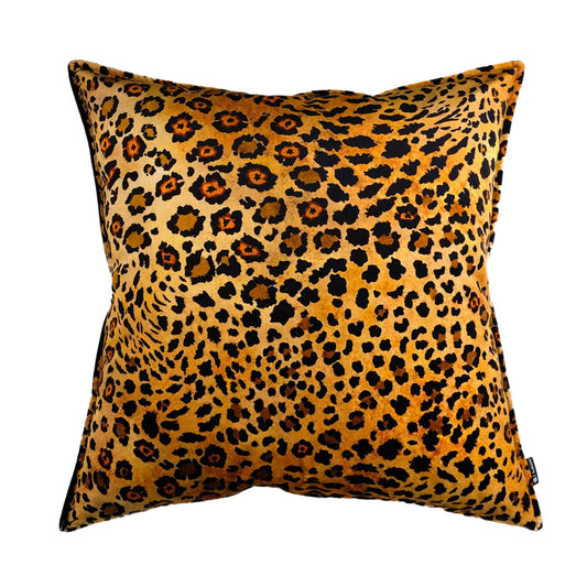 Front view of the square Safari Spot Pillow made of golden-yellow velvet with a dark brown leopard spot print.