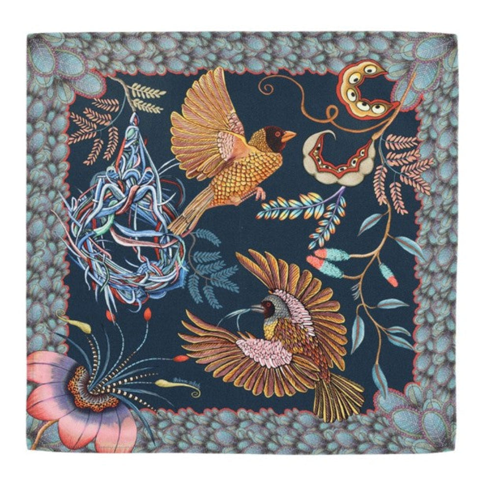 Midnight Thanda Nest napkin with African masked weaver birds, woven nest, flowers, foliage, and patterned border.