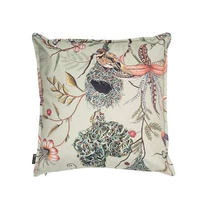 Back view of the square sage green Thanda Nest Pillow showcasing weaver birds sitting on intricate woven nests among tropical vines and pink flowers.