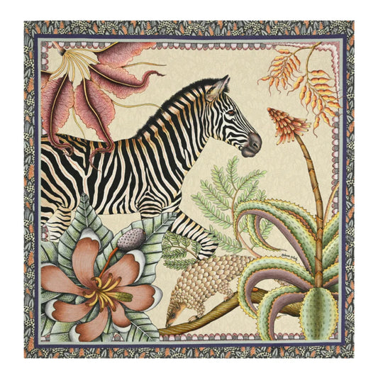 Thanda Stripe Napkin featuring an illustrated zebra surrounded by oversized flowers, layered tropical leaves, and botanical details in cream, rust, green, pink, and black tones with a decorative border.