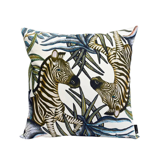 Thanda Stripe pillow with two zebras among blue and green foliage on a white cotton background.